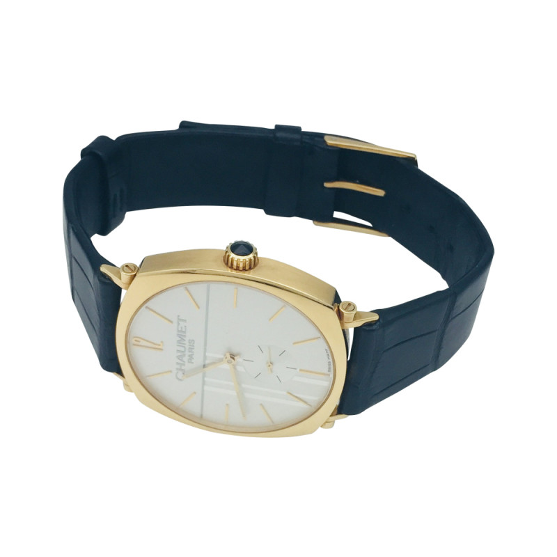 Yellow gold Chaumet watch "Dandy" collection on a leather band.