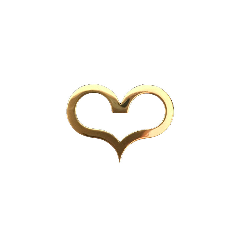Yellow gold Dinh Van heart pendant.